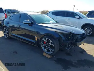 2019 Kia Stinger GT with VIN KNAE35LC3K6059198, listed as a IAAI auction lot 41599686 with 82,886 mi miles. Bid and sale history available at carsss.com. Image 1.