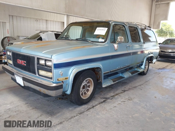 1989 GMC Suburban with VIN 1GKER16K7KF509078, listed as a IAAI auction lot 42593032 with 86,175 mi miles and . Bid and sale history available at DreamBid. Image 2.