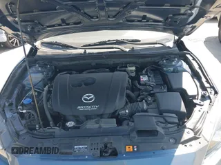 2016 Mazda 3 i Sport with VIN 3MZBM1T78GM285465, listed as a IAAI auction lot 42000874 with 71,272 mi miles and . Bid and sale history available at DreamBid. Image 10.