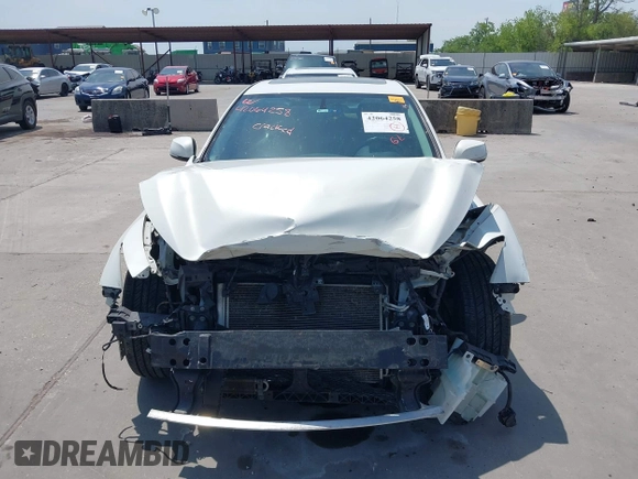 2014 Infiniti Q50 Premium z VIN JN1BV7AP8EM691683, wystawiony jako IAAI lot #42064258 z przebiegiem 146 805 mil mil oraz . Historia ofert i sprzedaży dostępna na DreamBid. Obrazek 13.