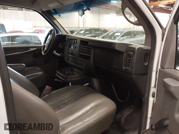 2011 Chevrolet Express Cargo Van with VIN 1GCWGGFAXB1122893, listed as a IAAI auction lot 41695753 with 232,658 mi miles. Bid and sale history available at carsss.com. Image 5.
