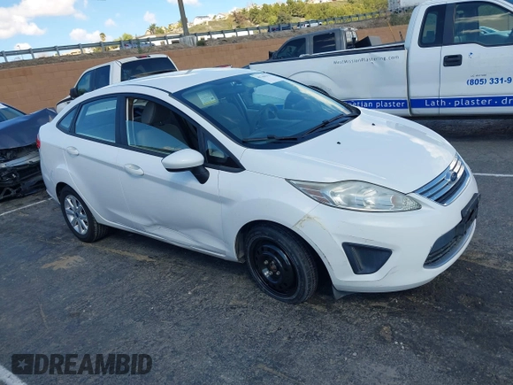 2012 Ford Fiesta SE with VIN 3FADP4BJ7CM102932, listed as a IAAI auction lot 41760394 with 70,394 mi miles and . Bid and sale history available at carsss.com. Image 1.