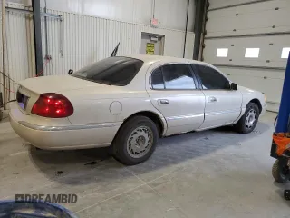 2002 Lincoln Continental with VIN 1LNHM97VX2Y694578, listed as a Copart auction lot 42245705 with 195,236 mi miles and Salvage Title. Bid and sale history available at carsss.com. Image 3.