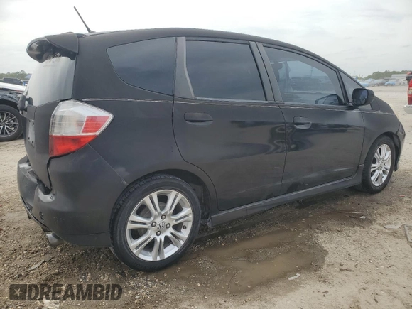 2009 Honda Fit Sport with VIN JHMGE88479S060797, listed as a Copart auction lot 54009135 with 167,914 mi miles and Salvage Title. Bid and sale history available at carsss.com. Image 3.