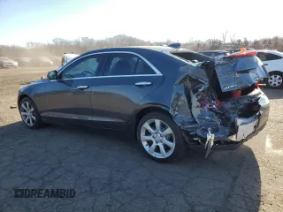 2015 Cadillac ATS Standard AWD with VIN 1G6AG5RX8F0135123, listed as a Copart auction lot 87646585 with 130,446 mi miles and Salvage title. Bid and sale history available at DreamBid. Image 2.