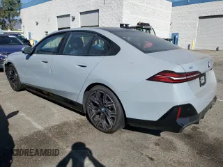 2024 BMW i5 eDrive40 with VIN WBY33FK01RCN99702, listed as a Copart auction lot 78737934 with 11,889 mi miles and Salvage Title. Bid and sale history available at carsss.com. Image 2.
