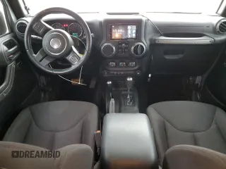 2015 Jeep Wrangler Unlimited Willys Wheeler with VIN 1C4BJWDG4FL723924, listed as a Copart auction lot 47145245 with 166,256 mi miles and Salvage Title. Bid and sale history available at DreamBid. Image 8.