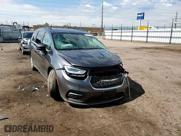 2022 Chrysler Pacifica Touring L with VIN 2C4RC1BG8NR158629, listed as a Copart auction lot 58541395 with 76,544 mi miles and Salvage title. Bid and sale history available at DreamBid. Image 14.