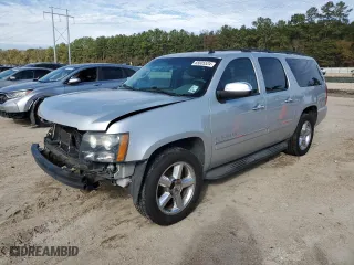 2014 Chevrolet Suburban LTZ with VIN 1GNSCKE02ER141764, listed as a Copart auction lot 85005524 with 234,019 mi miles and Salvage Title. Bid and sale history available at carsss.com. Image 1.