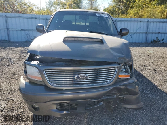 2002 Ford F-150 Harley Davidson with VIN 1FTRW07362KC77880, listed as a Copart auction lot 75259594 with 103,591 mi miles and Salvage Title. Bid and sale history available at carsss.com. Image 5.