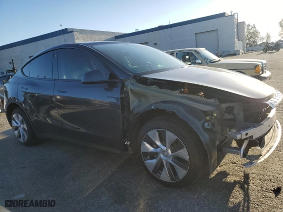 2022 Tesla Model Y Long Range with VIN 7SAYGDEE5NA022384, listed as a Copart auction lot 49283345 with 31,925 mi miles and Salvage Title. Bid and sale history available at carsss.com. Image 4.