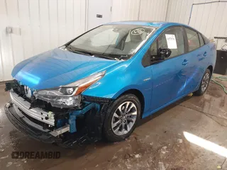 2021 Toyota Prius L Eco with VIN JTDKAMFU9M3135117, listed as a IAAI auction lot 41579736 with 35,795 mi miles and . Bid and sale history available at DreamBid. Image 18.