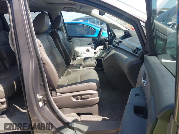 2014 Honda Odyssey Touring with VIN 5FNRL5H99EB075979, listed as a IAAI auction lot 42520154 with 99,314 mi miles and . Bid and sale history available at DreamBid. Image 5.