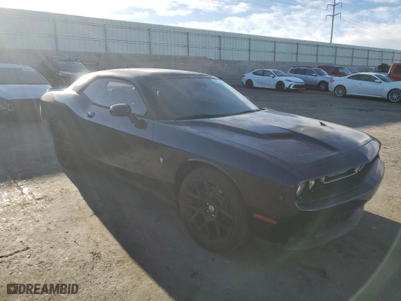2015 Dodge Challenger R/T Plus with VIN 2C3CDZBT5FH906277, listed as a Copart auction lot 48581795 with 74,611 mi miles and Salvage Title. Bid and sale history available at carsss.com. Image 4.