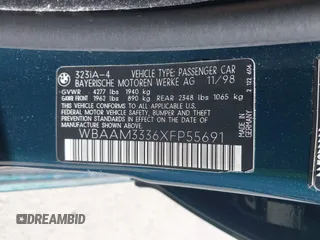 1999 BMW 3 Series 323i with VIN WBAAM3336XFP55691, listed as a IAAI auction lot 42033522 with 129,067 mi miles. Bid and sale history available at carsss.com. Image 9.