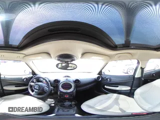 2013 MINI Countryman S ALL4 z VIN WMWZC5C56DWM16203, wystawiony jako Copart lot #54346425 z przebiegiem 148 065 mil mil oraz Szkoda całkowita • Salvage title. Historia ofert i sprzedaży dostępna na DreamBid. Obrazek 14.