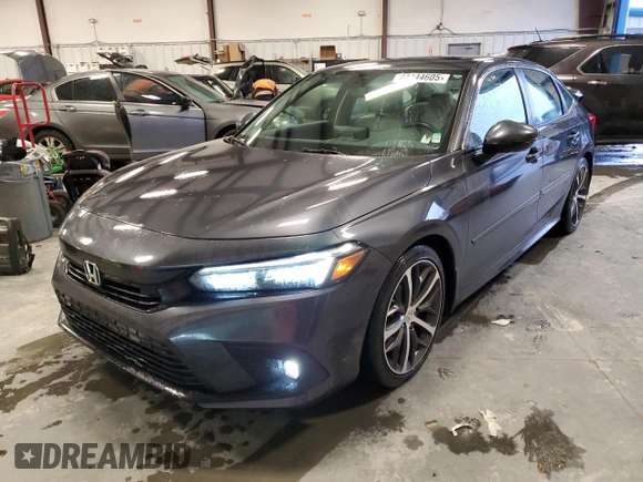 2022 Honda Civic Touring z VIN 2HGFE1F92NH315300, wystawiony jako Copart lot #44444605 z przebiegiem 52 469 mil mil oraz Szkoda całkowita • Salvage title. Historia ofert i sprzedaży dostępna na DreamBid. Obrazek 1.