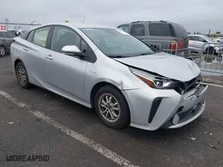 2022 Toyota Prius L Eco with VIN JTDKAMFU0N3175104, listed as a IAAI auction lot 40873671 with 1 mi miles. Bid and sale history available at carsss.com. Image 1.