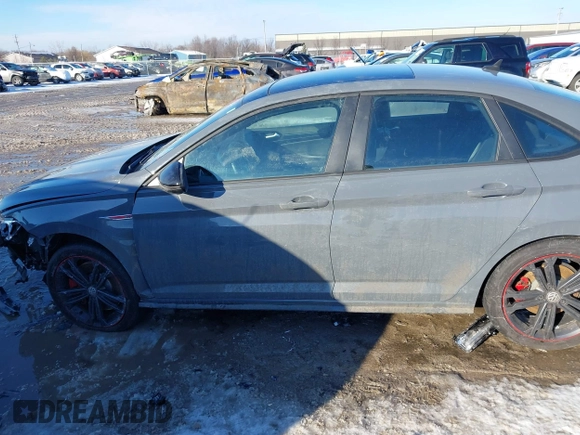 2019 Volkswagen Jetta GLI S z VIN 3VW6T7BU6KM209458, wystawiony jako IAAI lot #41334724 z przebiegiem 53 634 mil mil oraz . Historia ofert i sprzedaży dostępna na DreamBid. Obrazek 14.