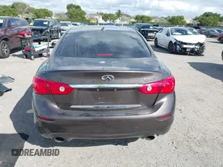 2014 Infiniti Q50 with VIN JN1BV7AP8EM679470, listed as a IAAI auction lot 41575121 with 84,880 mi miles. Bid and sale history available at carsss.com. Image 16.