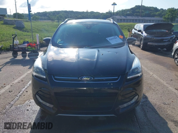 2016 Ford Escape Titanium with VIN 1FMCU9J97GUC21242, listed as a IAAI auction lot 42431567 with 96,946 mi miles and . Bid and sale history available at DreamBid. Image 12.