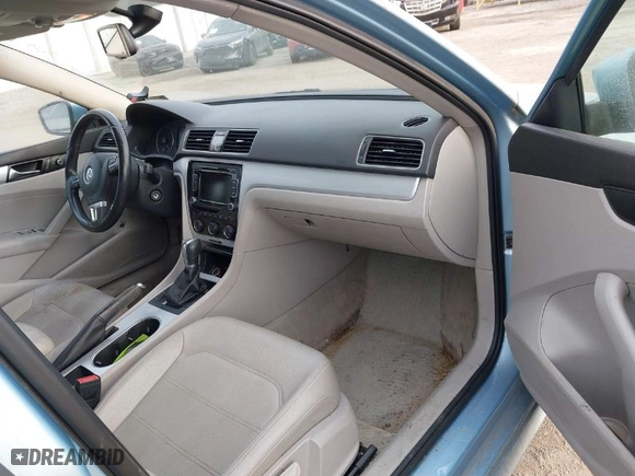 2013 Volkswagen Passat TDI SE w/Sunroof with VIN 1VWBN7A38DC094898, listed as a IAAI auction lot 41709347 with 120,035 mi miles. Bid and sale history available at carsss.com. Image 5.