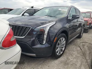 2022 Cadillac XT4 FWD Premium Luxury with VIN 1GYFZCR44NF166169, listed as a Copart auction lot 77981414 with 9,734 mi miles and Non Repairable. Bid and sale history available at carsss.com. Image 1.