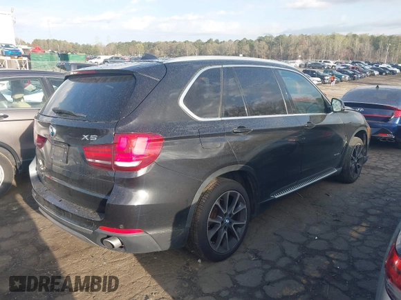 2014 BMW X5 sDrive35i with VIN 5UXKR2C50E0H31926, listed as a IAAI auction lot 41838021 with 125,813 mi miles. Bid and sale history available at carsss.com. Image 4.