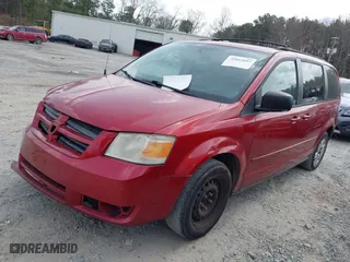 2010 Dodge Grand Caravan SE with VIN 2D4RN4DE7AR138618, listed as a IAAI auction lot 41812857 with 208,533 mi miles. Bid and sale history available at carsss.com. Image 2.