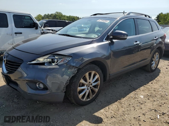 2015 Mazda CX-9 Grand Touring with VIN JM3TB3DV1F0461061, listed as a Copart auction lot 67194994 with 87,637 mi miles and Salvage Title. Bid and sale history available at carsss.com. Image 1.