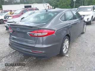 2019 Ford Fusion Titanium with VIN 3FA6P0SU9KR126985, listed as a IAAI auction lot 42255509 with 138,779 mi miles and . Bid and sale history available at DreamBid. Image 4.