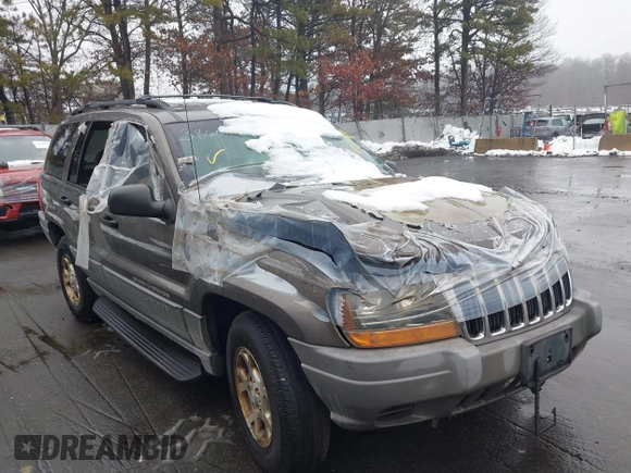 2000 Jeep Grand Cherokee Laredo with VIN 1J4GW48S1YC170303, listed as a IAAI auction lot 41582257 with 191,062 mi miles and . Bid and sale history available at DreamBid. Image 1.