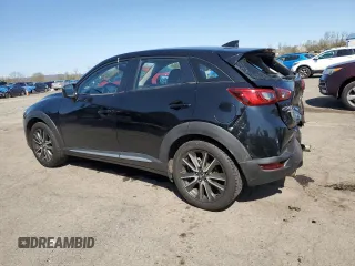 2016 Mazda CX-3 Grand Touring z VIN JM1DKBD79G0124504, wystawiony jako Copart lot #53663945 z przebiegiem 94 253 mil mil oraz Szkoda całkowita • Salvage title. Historia ofert i sprzedaży dostępna na DreamBid. Obrazek 2.