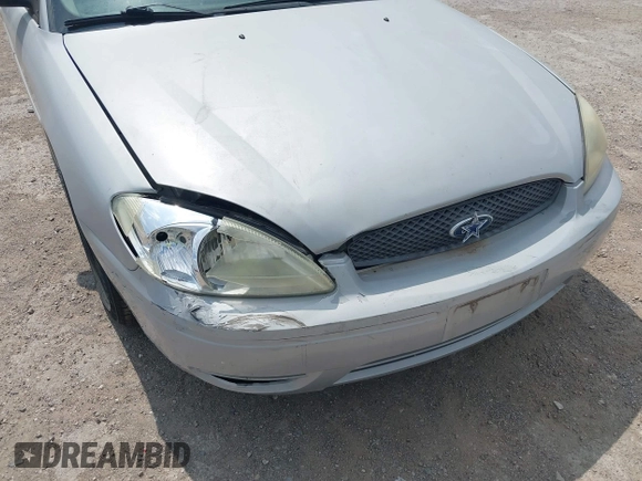 2005 Ford Taurus SE with VIN 1FAFP53U85A102770, listed as a IAAI auction lot 41963794 with 174,380 mi miles. Bid and sale history available at carsss.com. Image 6.