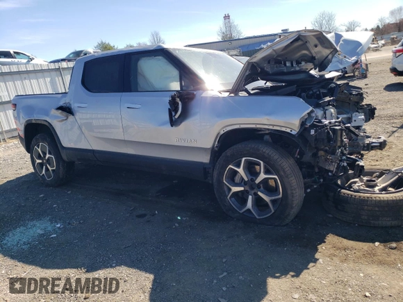 2023 Rivian R1T Adventure with VIN 7FCTGBAA8PN027711, listed as a Copart auction lot 49449155 with 16,031 mi miles and Salvage Title. Bid and sale history available at carsss.com. Image 4.