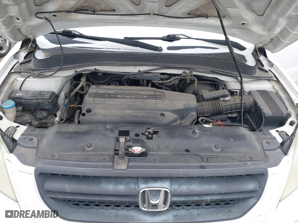 2004 Honda Pilot EX with VIN 2HKYF18464H503605, listed as a IAAI auction lot 41373673 with 112,919 mi miles. Bid and sale history available at carsss.com. Image 10.