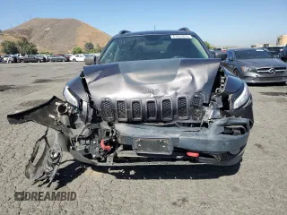 2017 Jeep Cherokee Trailhawk L Plus with VIN 1C4PJMBS4HD237094, listed as a Copart auction lot 61051675 with 104,852 mi miles and Salvage title. Bid and sale history available at DreamBid. Image 5.