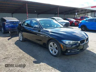 2017 BMW 3 Series 330i with VIN WBA8B9C50HK676437, listed as a IAAI auction lot 41746379 with 115,341 mi miles. Bid and sale history available at carsss.com. Image 1.