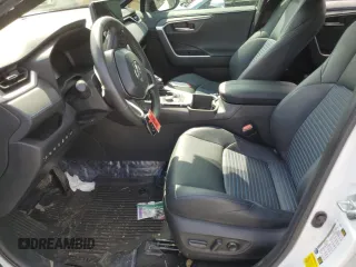 2023 Toyota RAV4 Hybrid XSE with VIN 2T3E6RFVXPW040152, listed as a Copart auction lot 61645565 with 26,408 mi miles and Salvage title. Bid and sale history available at DreamBid. Image 7.