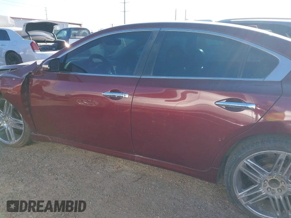 2013 Nissan Maxima S with VIN 1N4AA5AP7DC807233, listed as a IAAI auction lot 41760607 with 163,599 mi miles and . Bid and sale history available at DreamBid. Image 15.
