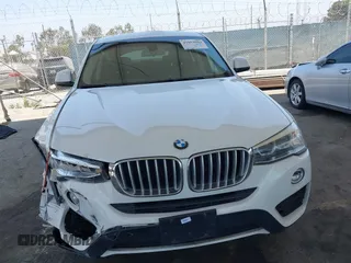 2015 BMW X4 xDrive28i with VIN 5UXXW3C5XF0M89259, listed as a IAAI auction lot 42553903 with 98,960 mi miles and . Bid and sale history available at DreamBid. Image 12.