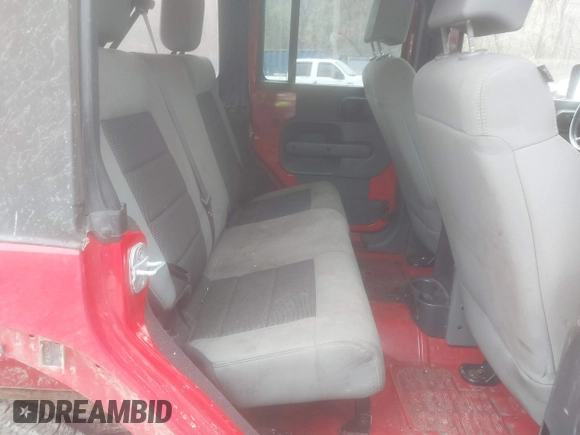 2008 Jeep Wrangler Unlimited X with VIN 1J8GA39128L562347, listed as a IAAI auction lot 41912669 with 106,040 mi miles and . Bid and sale history available at carsss.com. Image 8.