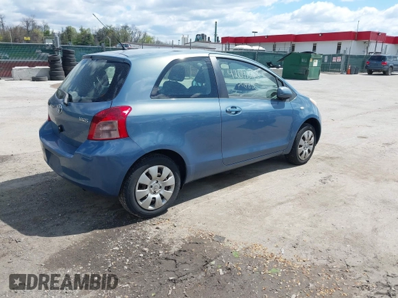 2008 Toyota Yaris with VIN JTDJT903385184035, listed as a IAAI auction lot 42048168 with 140,603 mi miles. Bid and sale history available at carsss.com. Image 4.