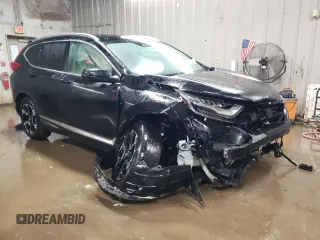 2017 Honda CR-V Touring with VIN 2HKRW2H91HH608340, listed as a Copart auction lot 43997625 with 58,446 mi miles and Salvage Title. Bid and sale history available at DreamBid. Image 4.
