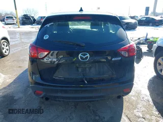 2014 Mazda CX-5 Sport with VIN JM3KE2BE7E0313978, listed as a IAAI auction lot 41437144 with 161,181 mi miles and . Bid and sale history available at carsss.com. Image 16.
