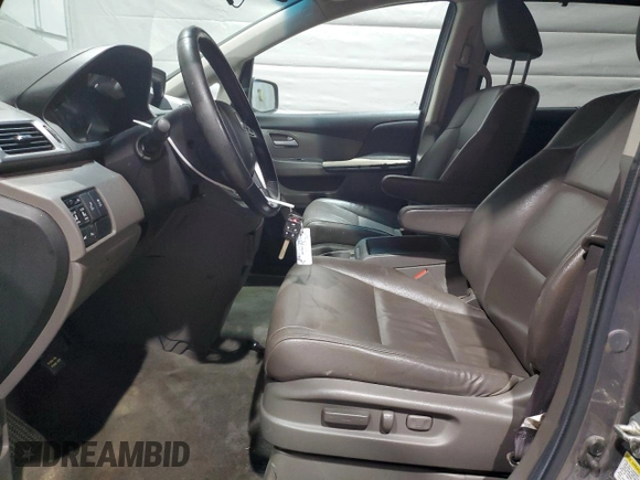 2013 Honda Odyssey Touring with VIN 5FNRL5H91DB024040, listed as a Copart auction lot 57241615 with 163,788 mi miles and Salvage title. Bid and sale history available at DreamBid. Image 7.