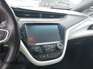 2020 Chevrolet Bolt EV LT z VIN 1G1FY6S08L4106463, wystawiony jako IAAI lot #42172094 z przebiegiem Nie podano mil oraz . Historia ofert i sprzedaży dostępna na DreamBid. Obrazek 18.