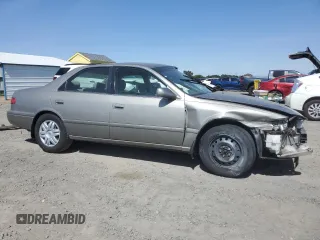 2001 Toyota Camry CE z VIN JT2BG22K410568101, wystawiony jako Copart lot #57184125 z przebiegiem Nie podano mil oraz Szkoda całkowita • Salvage title. Historia ofert i sprzedaży dostępna na DreamBid. Obrazek 4.