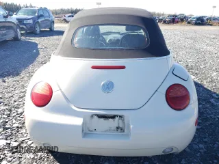 2005 Volkswagen Beetle with VIN 3VWCM21Y15M311018, listed as a Copart auction lot 77611914 with 187,498 mi miles and Salvage Title. Bid and sale history available at DreamBid. Image 6.