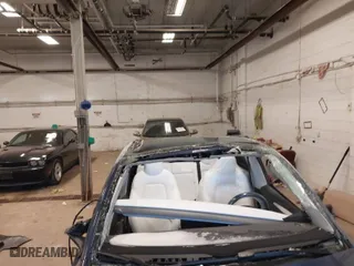 2025 Tesla Model Y Long Range with VIN 7SAYGDEE4SF216077, listed as a IAAI auction lot 41371627 with 4 miles. Bid and sale history available at carsss.com. Image 6.